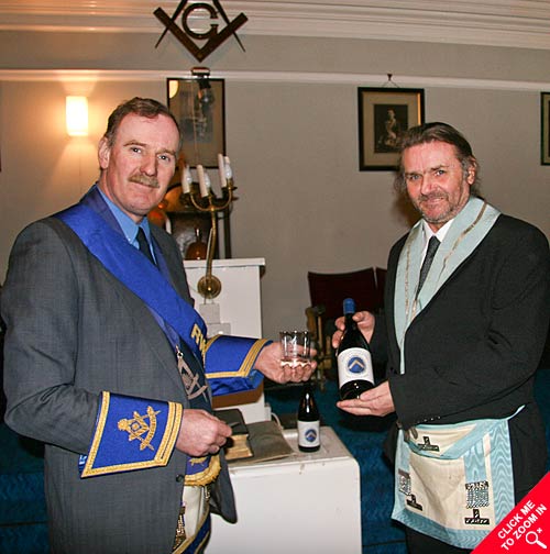 Brian Smith presenting RWM Bruce Taylor with a gist from his lodge in England - CLICK FOR FULL SIZED IMAGE