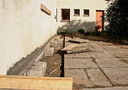 Shuttering almost ready to come off in readness for re-laying the paving.